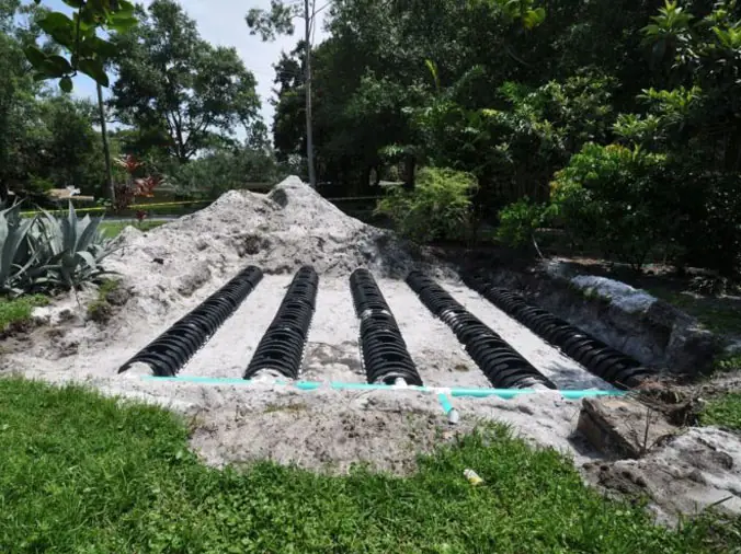 Septic system uncovered in ground